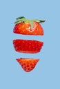 Strawberry berry cut into pieces, levitation, creative. Ripe fresh strawberry Clipping Path. Professional studio macro