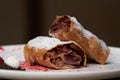 Strawberry biscuit roll with berry syrup and fromage frais