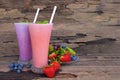 Strawberry and blueberry smoothies colorful fruit juice,beverage healthy the taste yummy In glass drink food for breakfast and sna