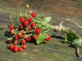 Strawberry bouquet. Red berries on a wooden table