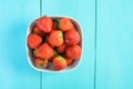 Strawberry Bowl On Blue Wood