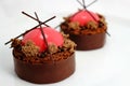 Strawberry and brownie dessert with dark chocolate jelly caviar on chocolate border