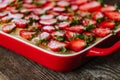 Strawberry cake on the old dark wooden table Royalty Free Stock Photo