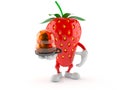 Strawberry character holding emergency siren