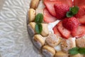 Strawberry charlotte cake. Summer dessert with Savoiardi on a glass tray decorated with mint leaves Royalty Free Stock Photo