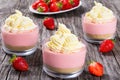 Strawberry Cheesecake Mousse Cups decorated by homemade ice cream Royalty Free Stock Photo