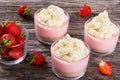 Strawberry Cheesecake Mousse Cups decorated by homemade ice cream Royalty Free Stock Photo