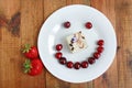 Strawberry cherry with cake in shape of smile Royalty Free Stock Photo