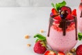 Strawberry chia seed pudding with yogurt, chocolate, fresh berries and mint for healthy tasty breakfast Royalty Free Stock Photo