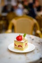 Strawberry Chiffon cake on white china plate