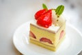 Strawberry Chiffon cake on white china plate