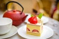 Strawberry Chiffon cake on white china plate