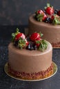 Strawberry and chocolate cake on a dark background. Close up brithday cake Royalty Free Stock Photo