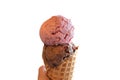 Strawberry and chocolate ice cream in a waffle cone isolated on a white background Royalty Free Stock Photo