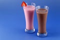 Strawberry and chocolate milkshake, sweet drink made with cow`s milk Royalty Free Stock Photo