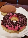 Strawberry chocolate topping donut pink