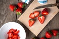 Strawberry on chopping wooden board