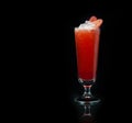 Strawberry cocktail with crushed ice on a black background Royalty Free Stock Photo