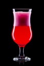 Strawberry cocktail in hurricane glass isolated on black background Royalty Free Stock Photo