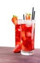 Strawberry cocktail with ice on old wood table near strawberry Royalty Free Stock Photo