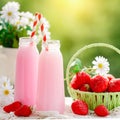 Strawberry cocktail or milkshake in a jar, basket with strawberries on a picnic, healthy food for Breakfast and snacks Royalty Free Stock Photo