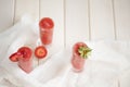 Strawberry cocktail on the wooden white table Royalty Free Stock Photo