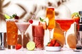 Strawberry cocktails set. Mocktails, smoothies and shakes with fruits and berries in glasses. Refreshing cold drinks and beverages Royalty Free Stock Photo