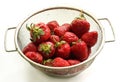 A strawberry is in a colander Royalty Free Stock Photo