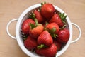 Strawberry in colander