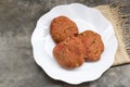 Strawberry cookies cashew nuts raisin in plate on stone table