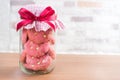 Strawberry cookies in glass canister, cap with plaid fabric