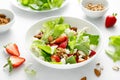 Strawberry and cottage cheese fresh fruit salad with walnut, almond and lettuce Royalty Free Stock Photo