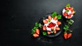 Strawberry with cream in a plate. Dessert. Berries Top view.