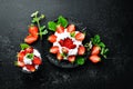 Strawberry with cream in a plate. Dessert. Berries Top view.