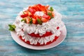 Strawberry and cream sponge cake. Homemade summer dessert on wooden table Royalty Free Stock Photo