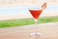 Strawberry daiquiri cocktail by a pool outdoors Royalty Free Stock Photo