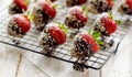 Strawberry dessert, Dark chocolate covered strawberries, fresh strawberries dipped in melted dark chocolate sprinkled with sesame