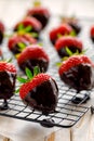 Strawberry dessert, Dark chocolate covered strawberries, fresh strawberries dipped in melted dark chocolate Royalty Free Stock Photo
