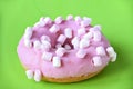 Strawberry donut covered with pink icing