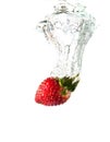 Strawberry dropped into water splash Royalty Free Stock Photo