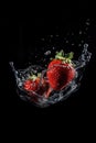 Strawberry Fall In Water, Red Fruit Splash, Juicy Strawberry Falling With Splash on Black Background