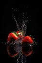 Strawberry Fall In Water, Red Fruit Splash, Juicy Strawberry Falling With Splash on Black Background