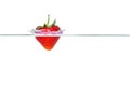 Strawberry falling into water with a splash Royalty Free Stock Photo