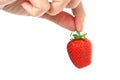Strawberry in the fingers
