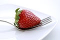 Strawberry on a fork Royalty Free Stock Photo