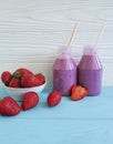 Strawberry smoothies fresh juicy taste breakfast towel summer on a pink wooden background