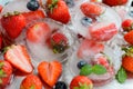 Strawberry frozen in ice on a white background Royalty Free Stock Photo