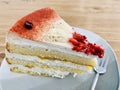 A strawberry frozen yogurt cake in a plate on wooden table. Top view. Royalty Free Stock Photo