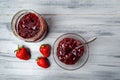 Strawberry fruit and jam on a wooden table Royalty Free Stock Photo