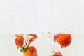 Strawberry fruit splash in clear water Royalty Free Stock Photo